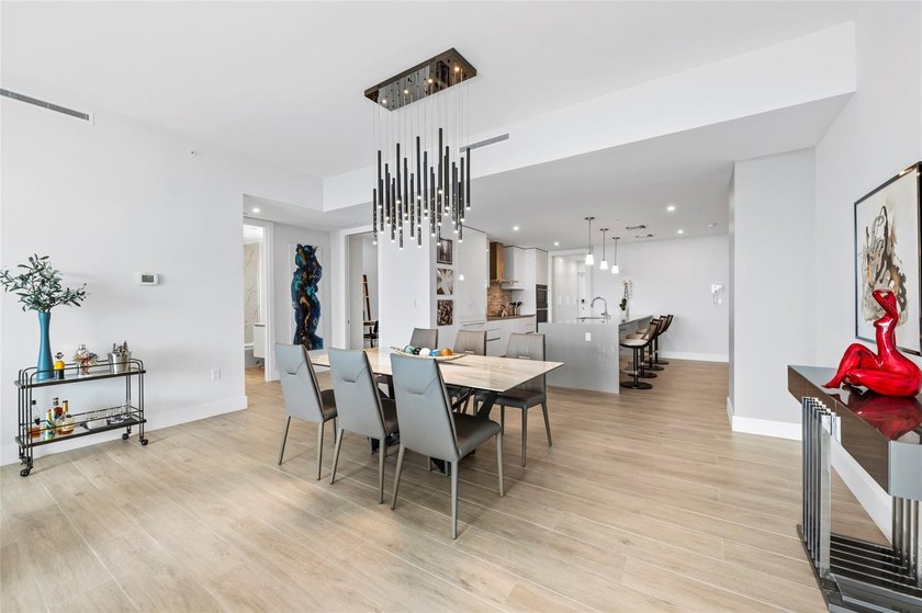 Experience luxury waterfront living at AquaBlu in Fort - photo 13