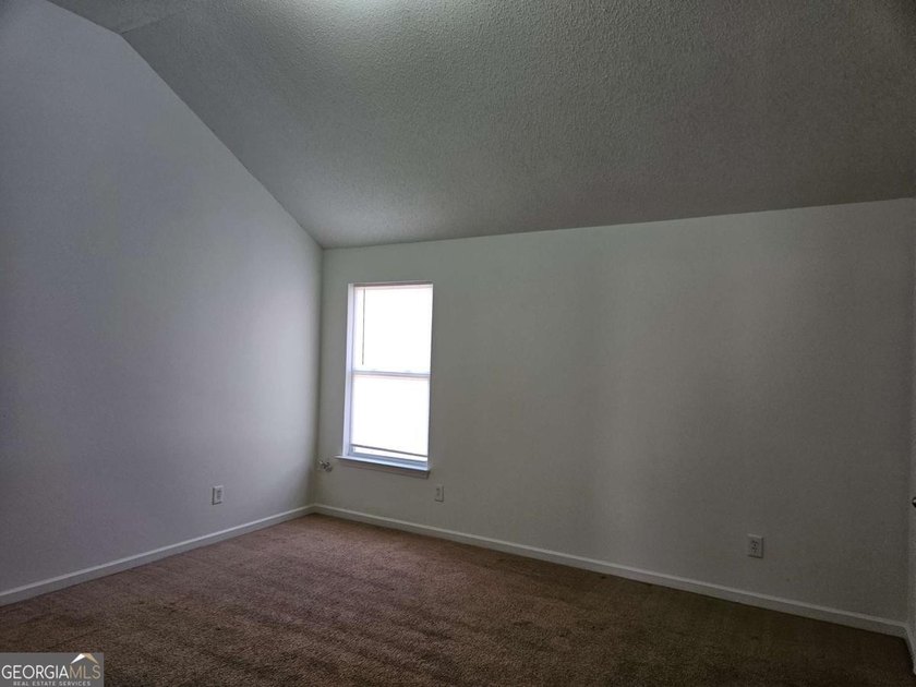 Welcome to this beautifully refreshed 4-bedroom, 2.5-bath home - photo 14