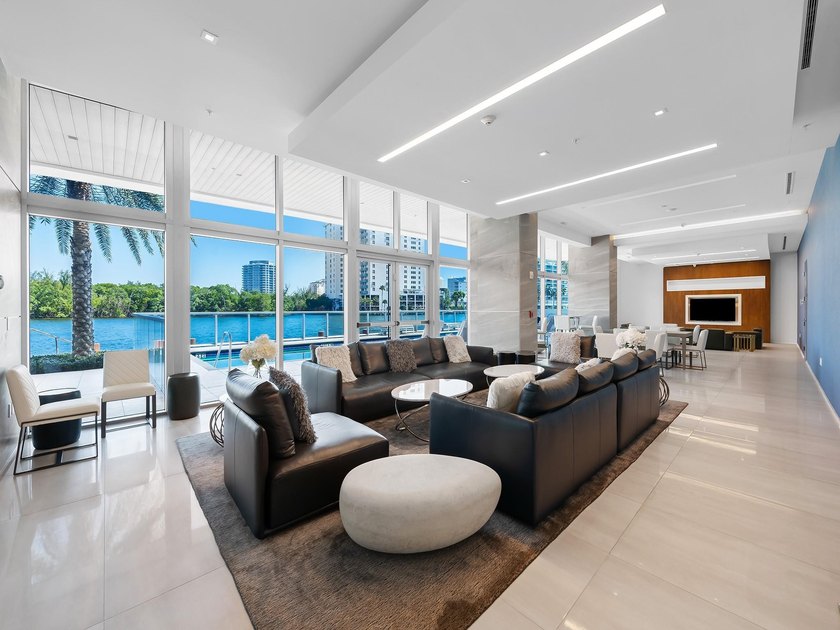 Experience luxury waterfront living at AquaBlu in Fort - photo 32