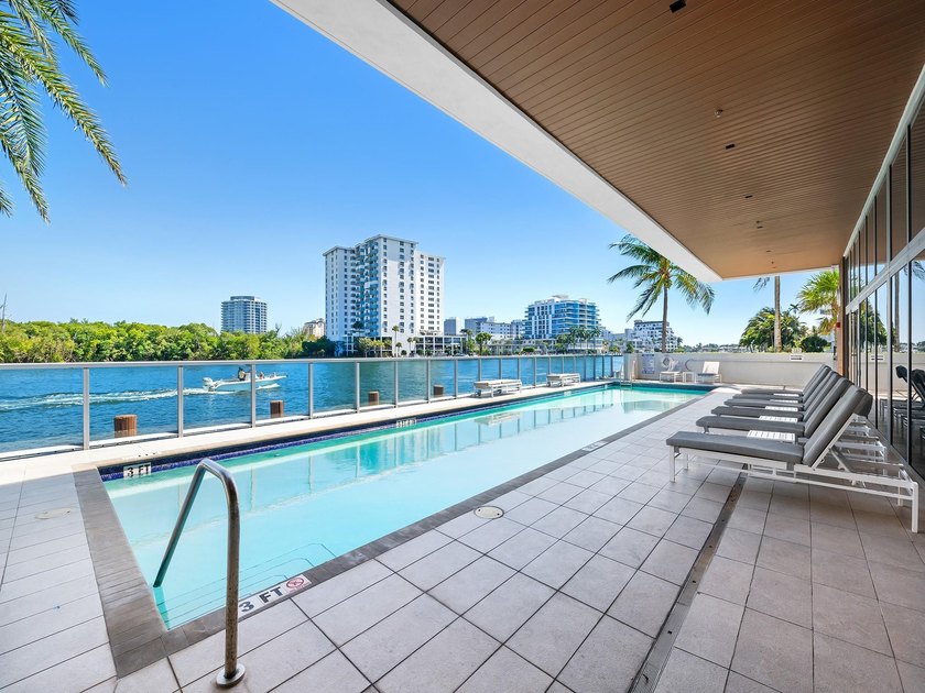 Experience luxury waterfront living at AquaBlu in Fort - photo 33