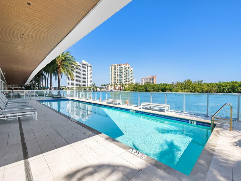 Experience luxury waterfront living at AquaBlu in Fort - photo 34