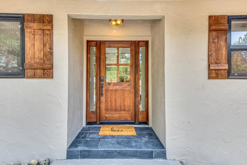 Discover sophisticated coastal living in this beautifully - photo 2