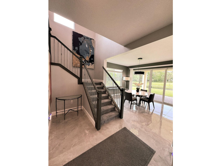 Welcome to this beautifully maintained two-story waterfront home - photo 4