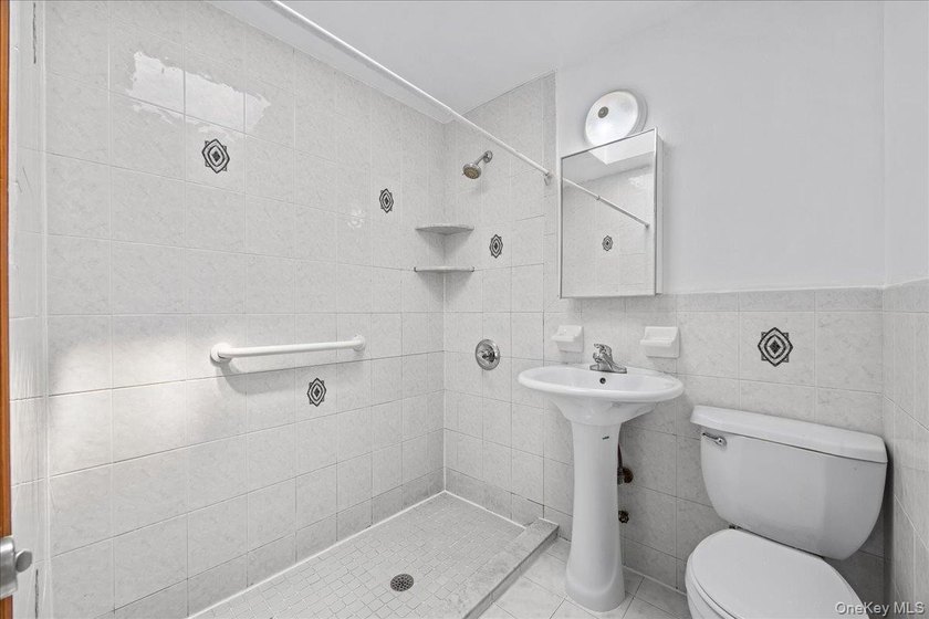 Welcome to this solid brick two-family home in the popular - photo 13