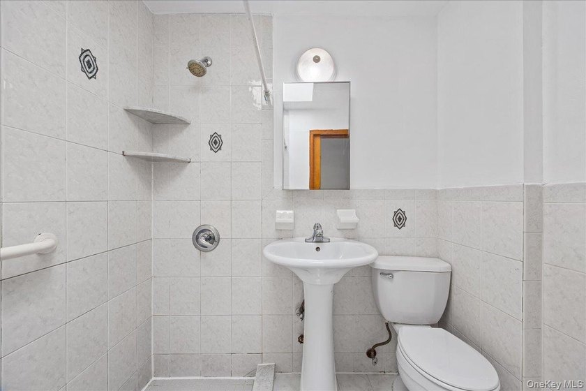 Welcome to this solid brick two-family home in the popular - photo 14