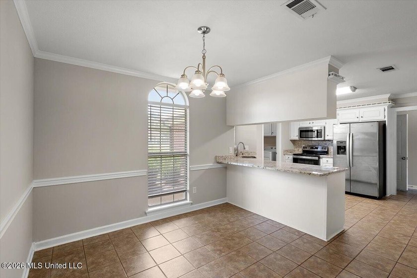 *QUALIFIES FOR USDA $0 DOWN* Welcome to this stunning 3-bedroom - photo 9