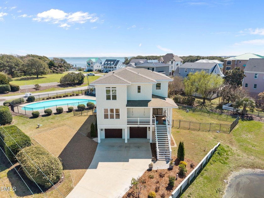 Welcome to your dream coastal retreat. This isn't just a house - photo 3