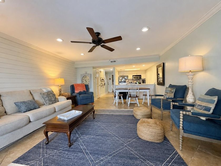 Wake up to peaceful lake views in this Beautifully Maintained - photo 4