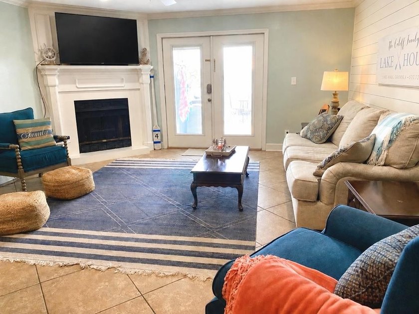 Wake up to peaceful lake views in this Beautifully Maintained - photo 5