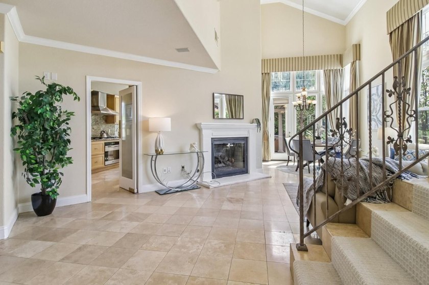 Rarely available, this townhouse-style condo is inside the - photo 7