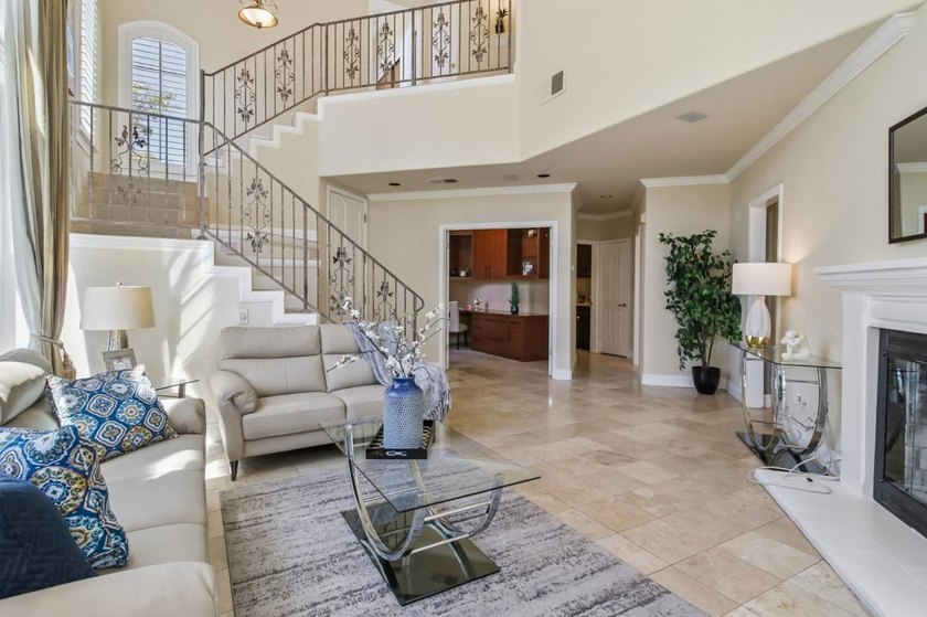 Rarely available, this townhouse-style condo is inside the - photo 8