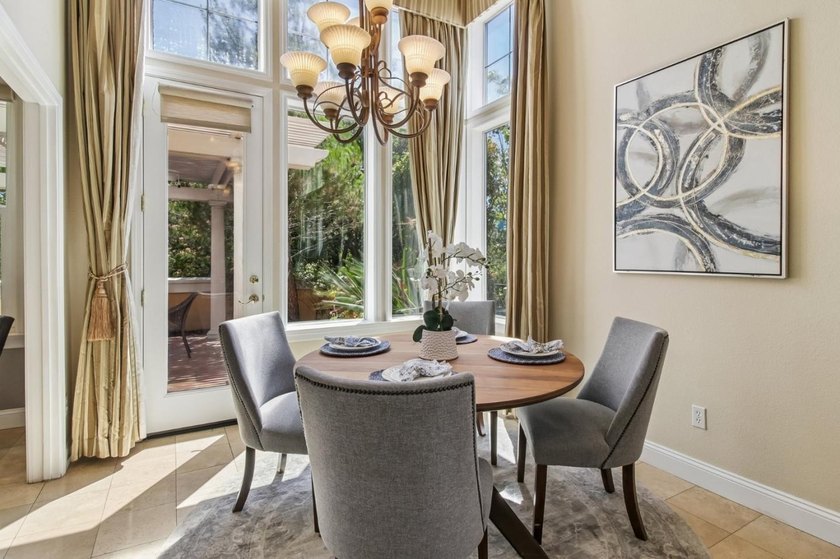 Rarely available, this townhouse-style condo is inside the - photo 10