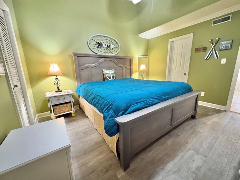 Wake up to peaceful lake views in this Beautifully Maintained - photo 10