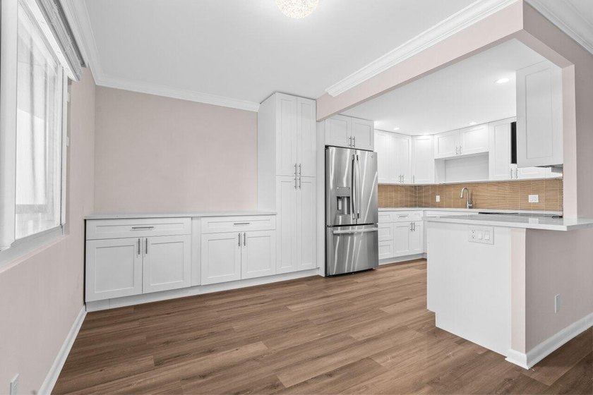 Brand New &amp; pristine 2 bedroom and full 2 bath unit. Located in - photo 8