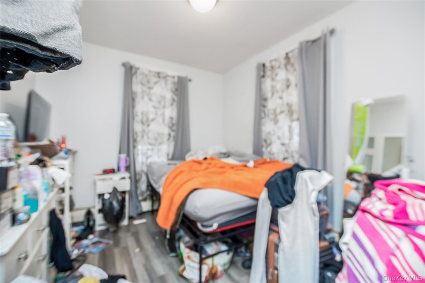 Welcome to this beautiful legal two-family home located in the - photo 15
