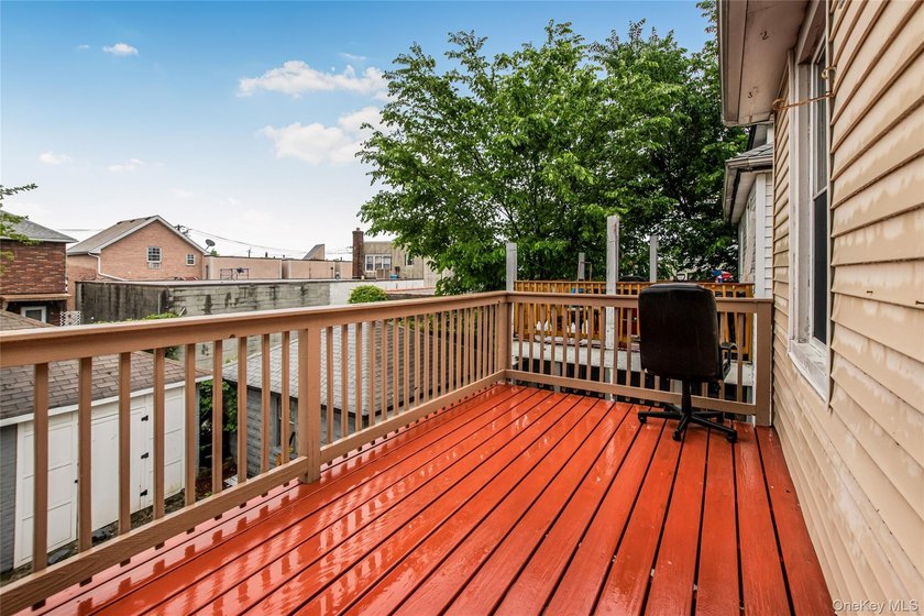 Welcome to this beautiful legal two-family home located in the - photo 18