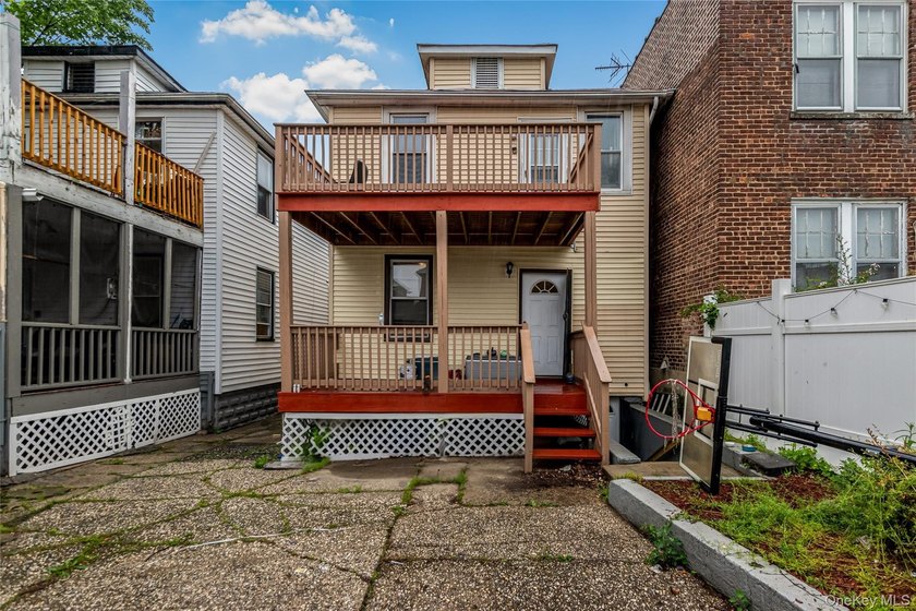 Welcome to this beautiful legal two-family home located in the - photo 19