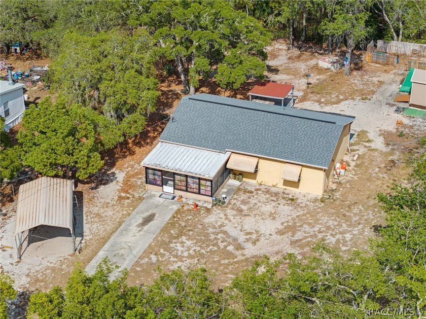 25,000 price reduction! Charming and versatile, this 2-bedroom - photo 2