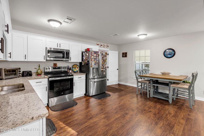 Welcome to 214 Simon Boulevard--where location, lifestyle, and - photo 9