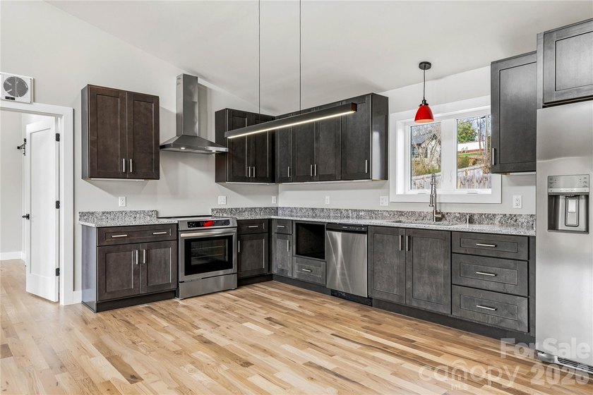 Experience elevated modern sustainability in this brand-new - photo 6