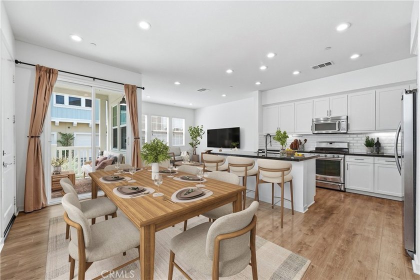 Welcome to this beautifully upgraded end unit townhome located - photo 4