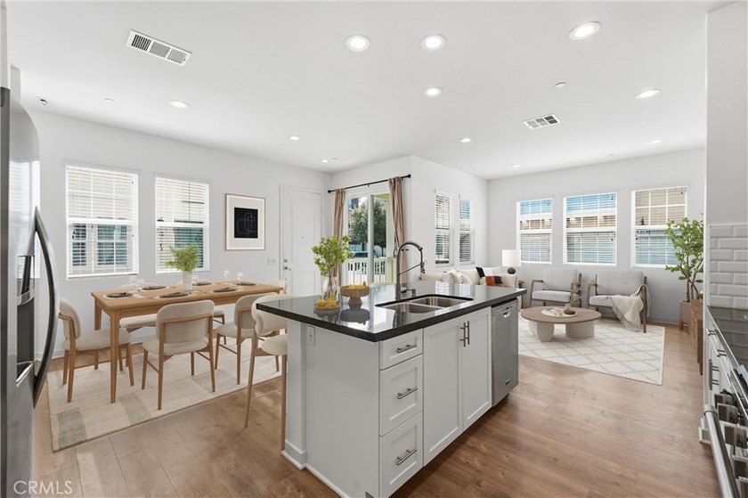 Welcome to this beautifully upgraded end unit townhome located - photo 7