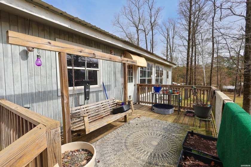 Conveniently located near Lake Greeson and area ATV trails, this - photo 2
