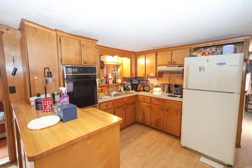 Conveniently located near Lake Greeson and area ATV trails, this - photo 4