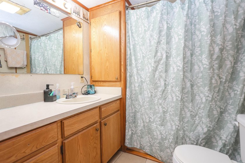 Conveniently located near Lake Greeson and area ATV trails, this - photo 8