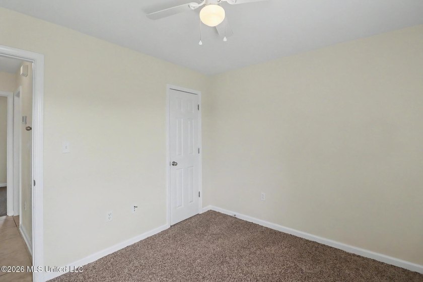 New to the market! This inviting 3-bedroom, 2-bath home offers a - photo 5