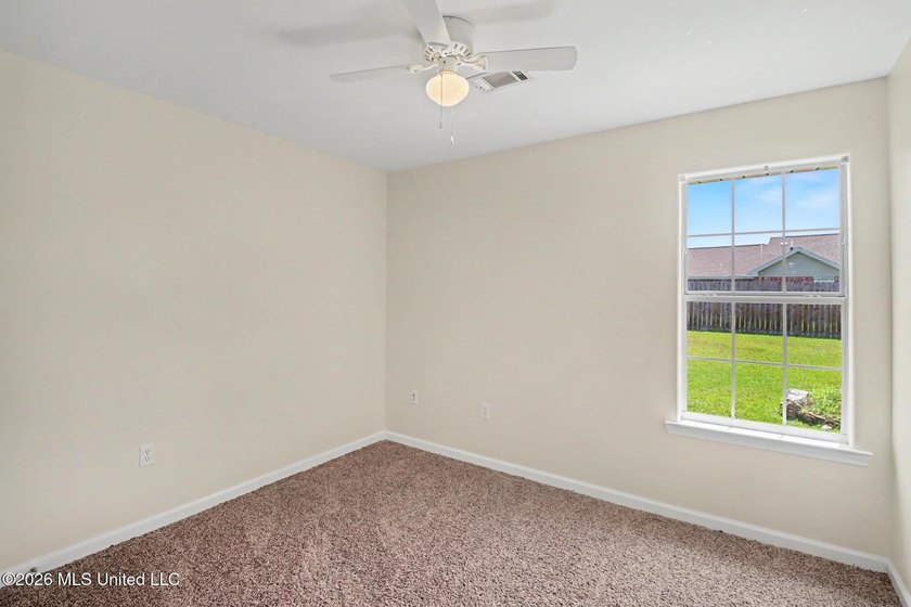New to the market! This inviting 3-bedroom, 2-bath home offers a - photo 6