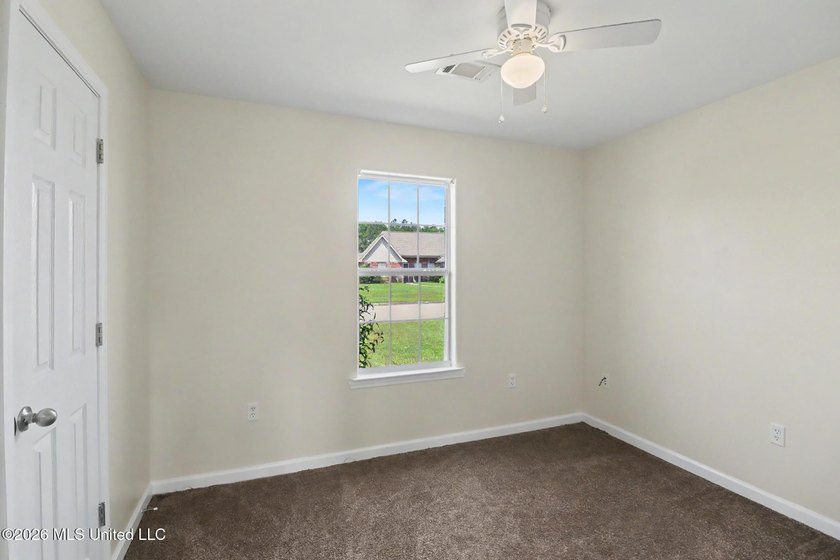 New to the market! This inviting 3-bedroom, 2-bath home offers a - photo 9
