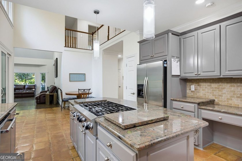 Tucked away on a beautifully landscaped lot of over 1 acre, this - photo 15