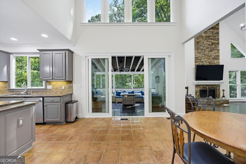 Tucked away on a beautifully landscaped lot of over 1 acre, this - photo 18