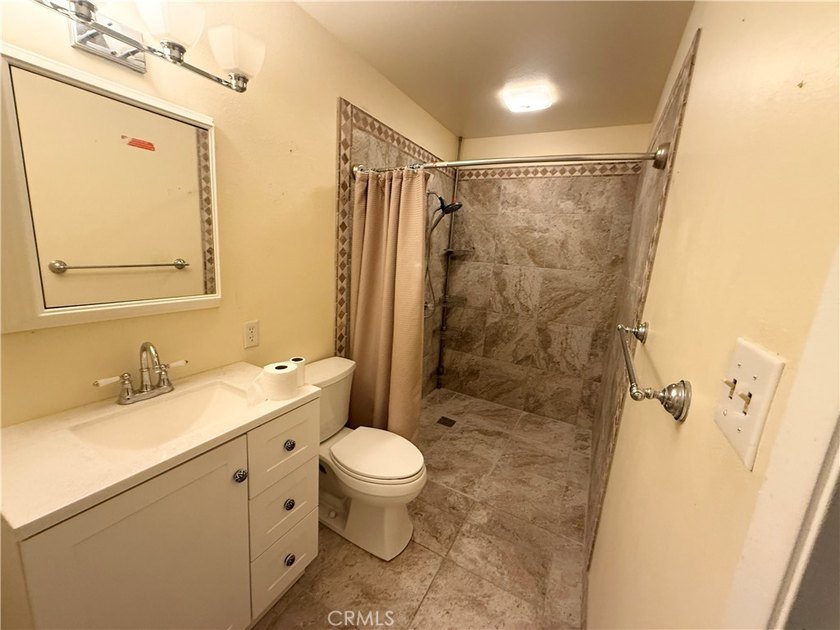 Discover the potential in this 3-bedroom, 2-bath home offering - photo 18