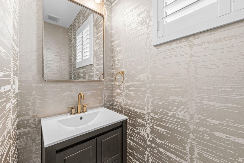 Beautifully upgraded and filled with natural light, this - photo 9