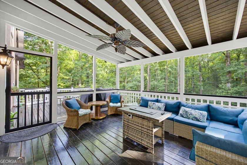 Tucked away on a beautifully landscaped lot of over 1 acre, this - photo 20