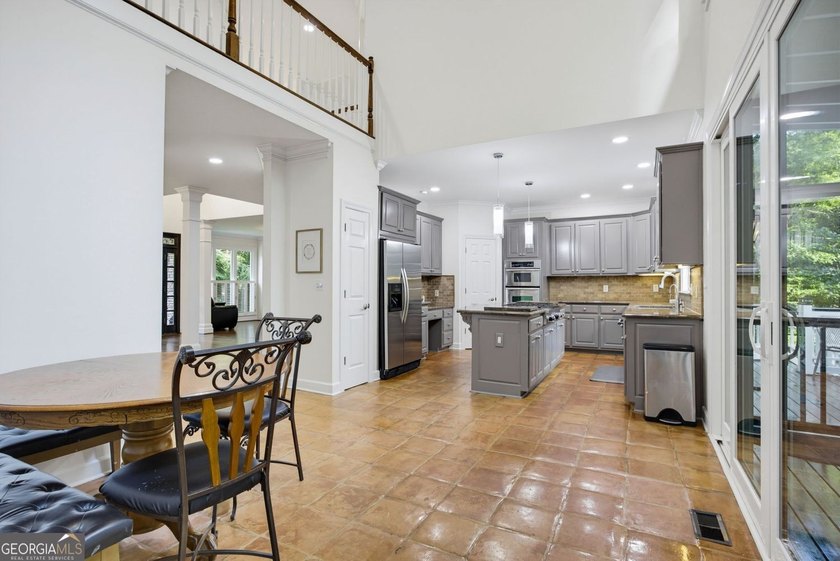 Tucked away on a beautifully landscaped lot of over 1 acre, this - photo 22