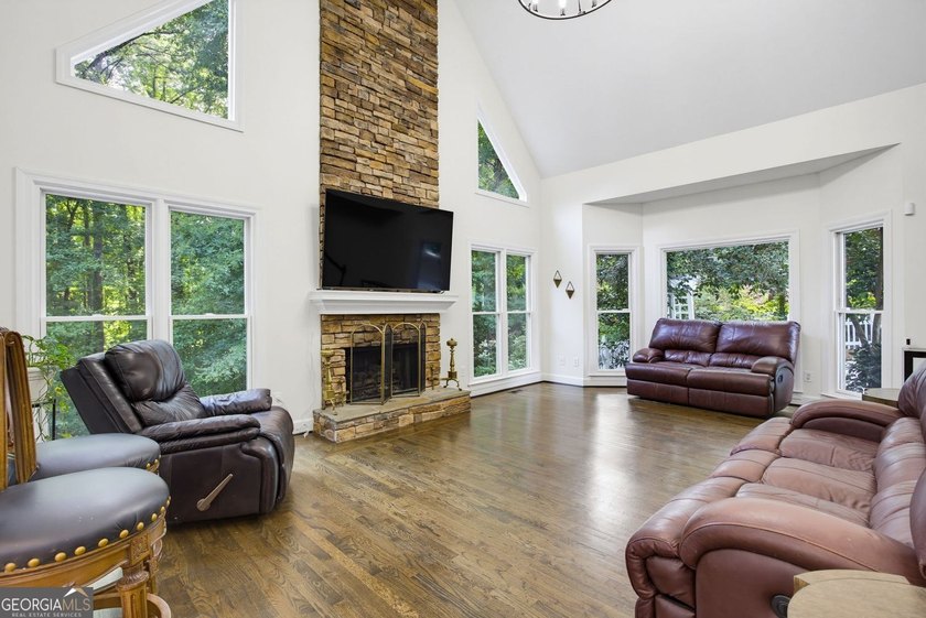 Tucked away on a beautifully landscaped lot of over 1 acre, this - photo 23