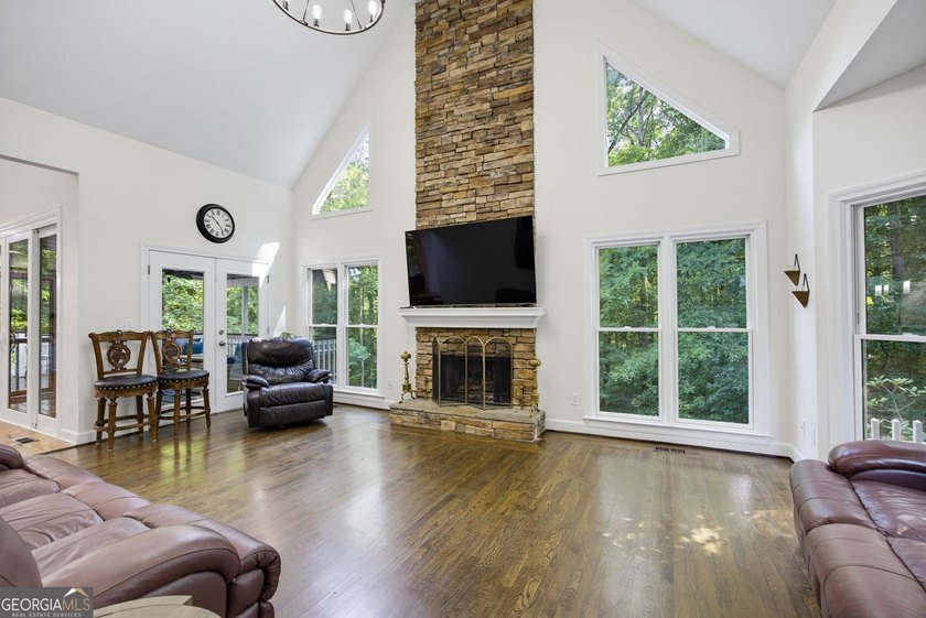 Tucked away on a beautifully landscaped lot of over 1 acre, this - photo 24