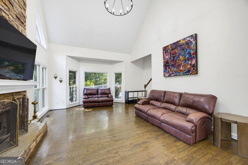 Tucked away on a beautifully landscaped lot of over 1 acre, this - photo 25