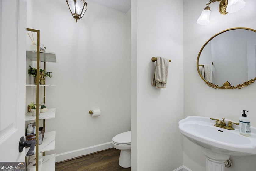 Tucked away on a beautifully landscaped lot of over 1 acre, this - photo 27