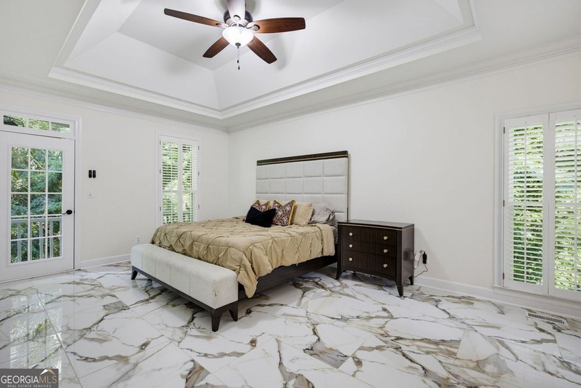 Tucked away on a beautifully landscaped lot of over 1 acre, this - photo 29