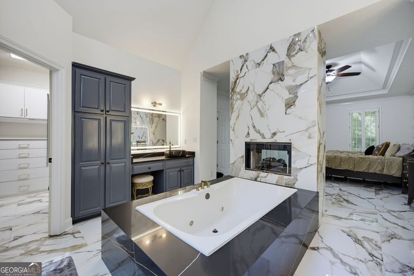 Tucked away on a beautifully landscaped lot of over 1 acre, this - photo 32