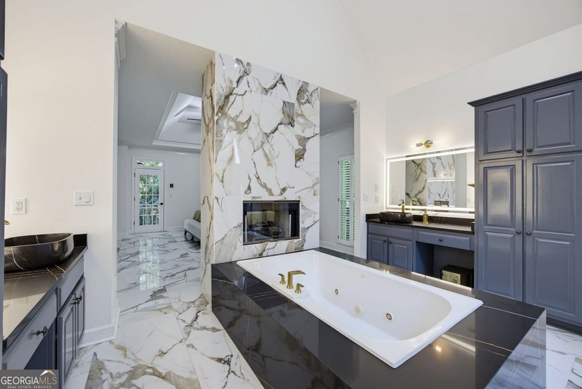 Tucked away on a beautifully landscaped lot of over 1 acre, this - photo 33