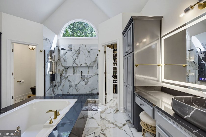 Tucked away on a beautifully landscaped lot of over 1 acre, this - photo 34