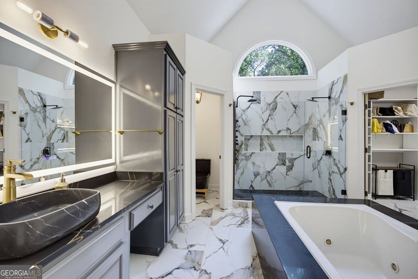 Tucked away on a beautifully landscaped lot of over 1 acre, this - photo 36