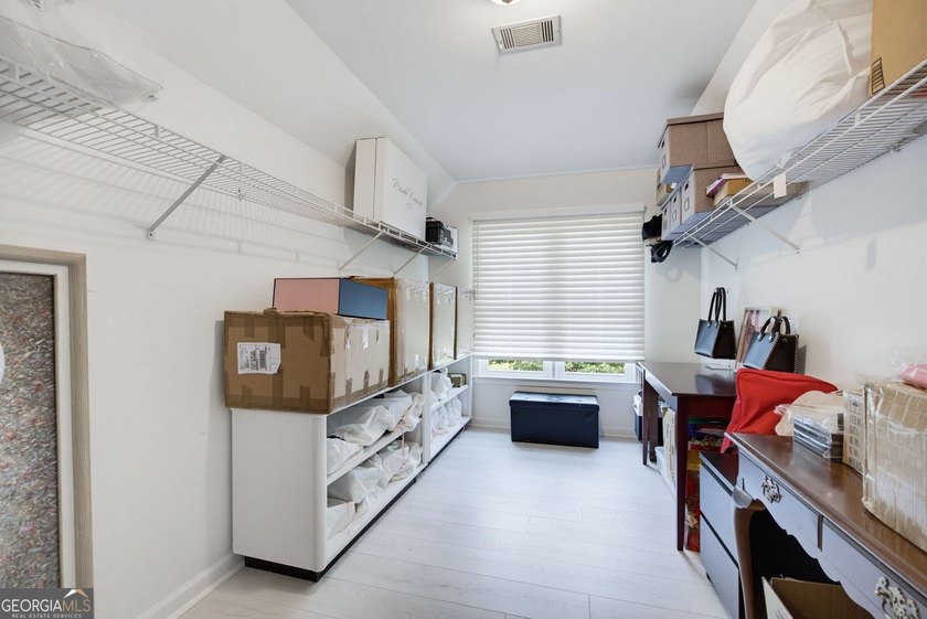 Tucked away on a beautifully landscaped lot of over 1 acre, this - photo 48