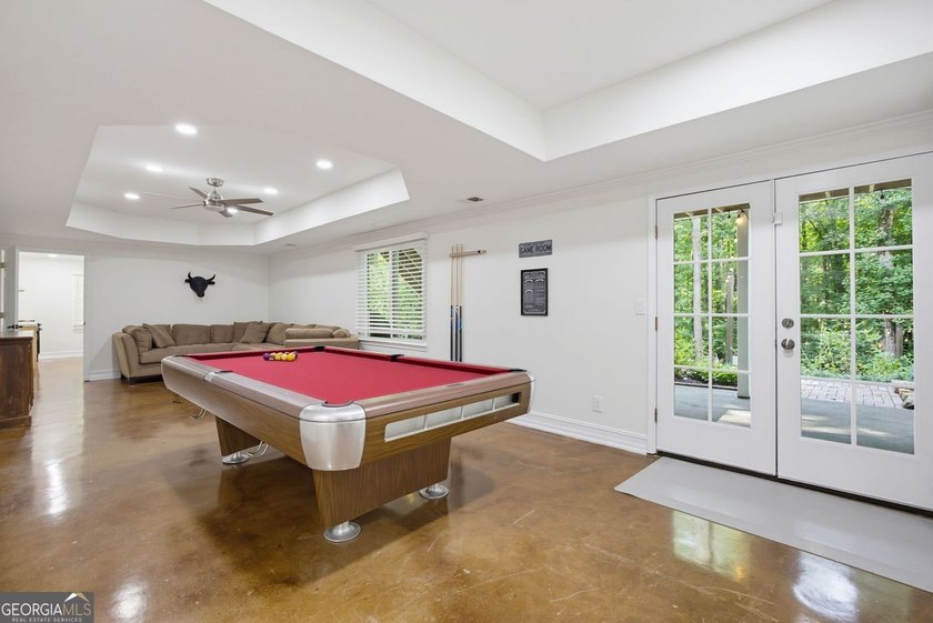 Tucked away on a beautifully landscaped lot of over 1 acre, this - photo 49