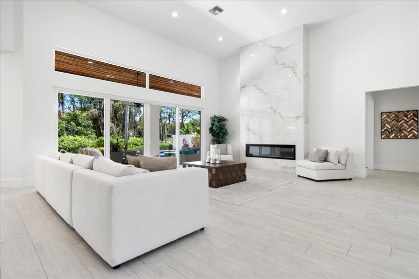 Come see this meticulously renovated residence is located in the - photo 3